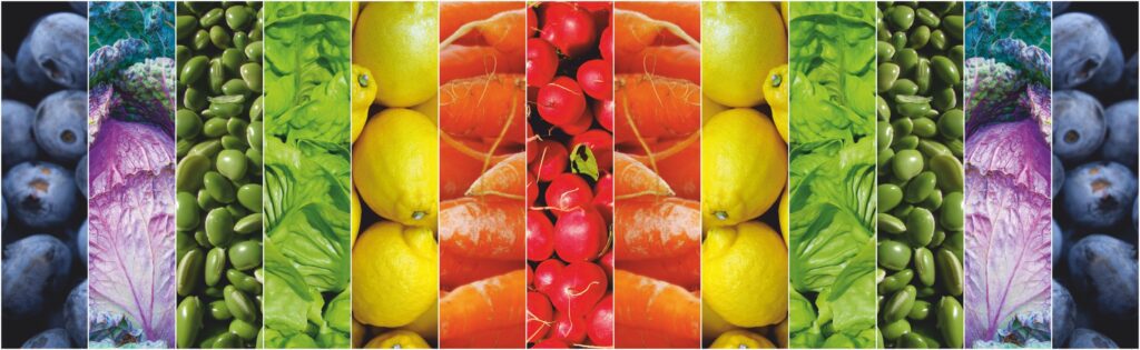 A display of colorful fruits and vegetables representing the recommendation to eat the rainbow